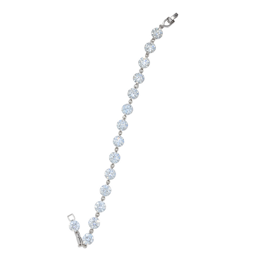 Classic tennis bracelet with perfectly aligned round-cut CZ stones, offering timeless sparkle and elegance.