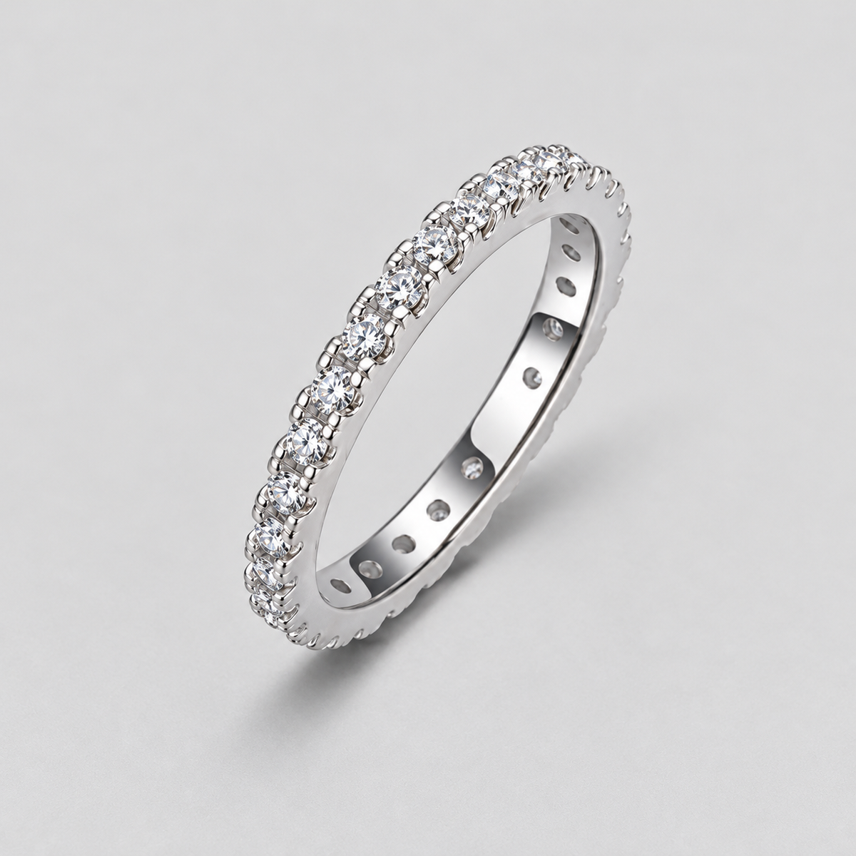 Round Moissanite Eternity Band in 925 sterling silver.