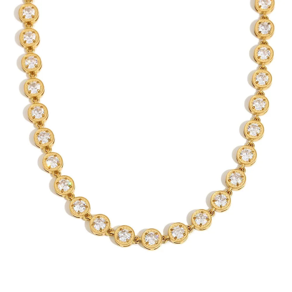 Clear round stone tennis necklace displayed on a white background