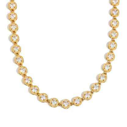 Clear round stone tennis necklace displayed on a white background