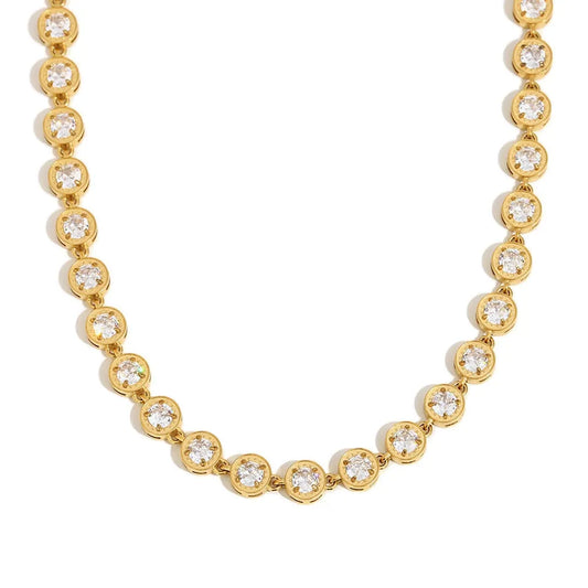 Clear round stone tennis necklace displayed on a white background