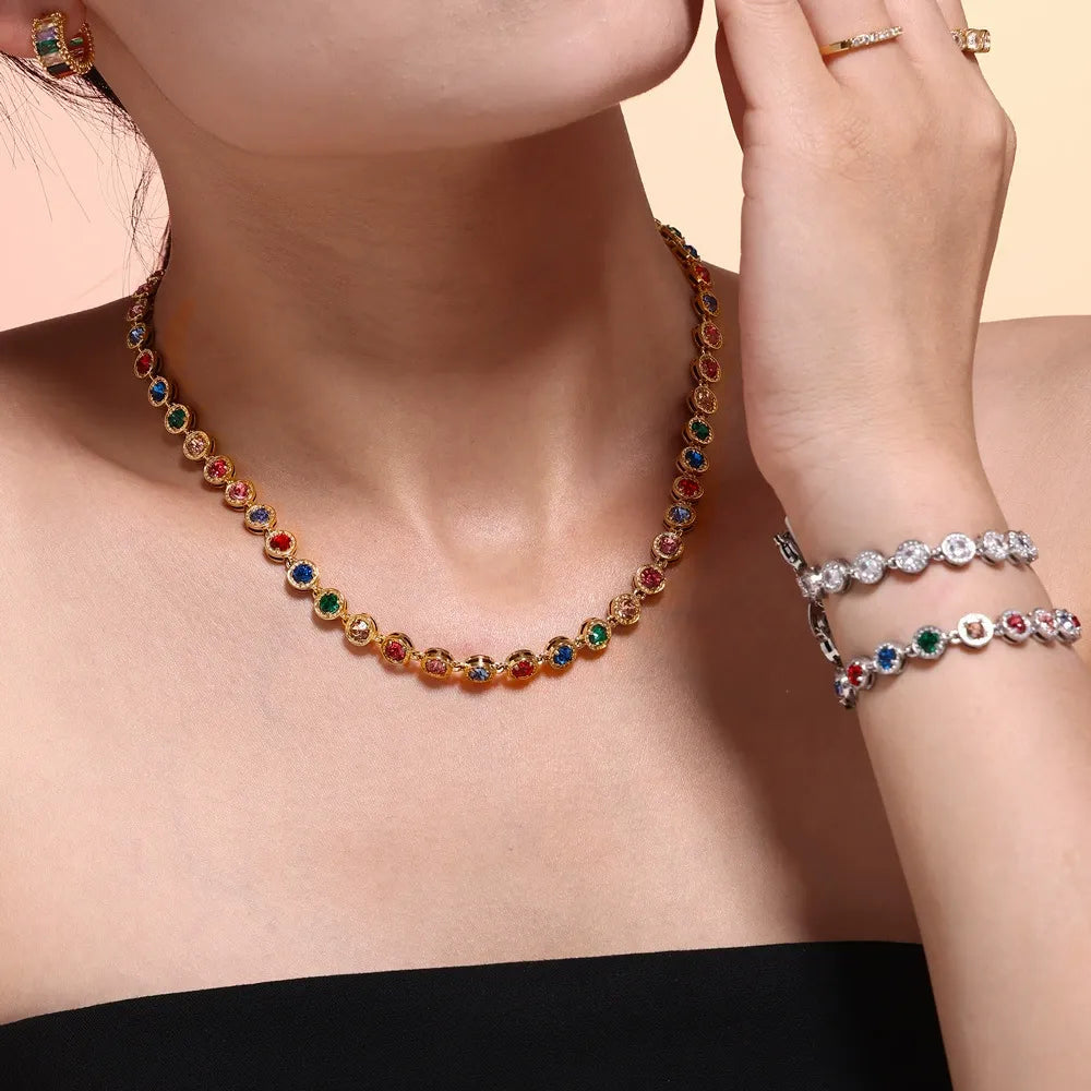 Multicolor round stone tennis necklace styled with matching bracelets