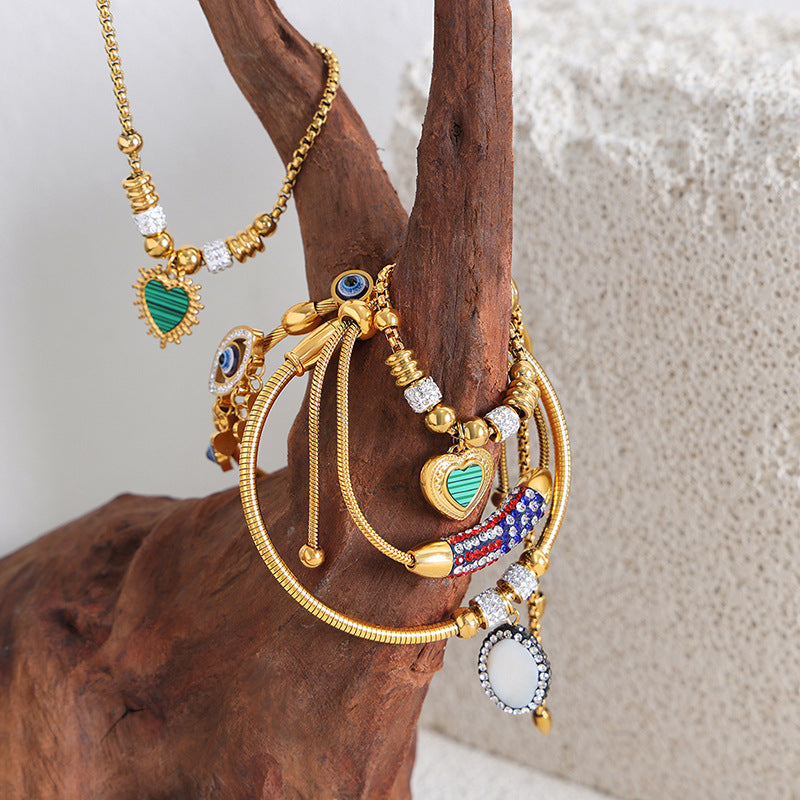 Round Heart Charm Chain Bracelets — flat lay 02