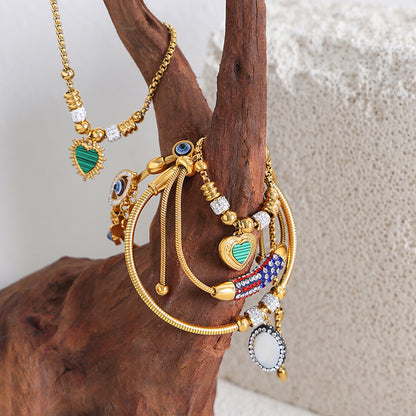 Round Heart Charm Chain Bracelets — flat lay 02