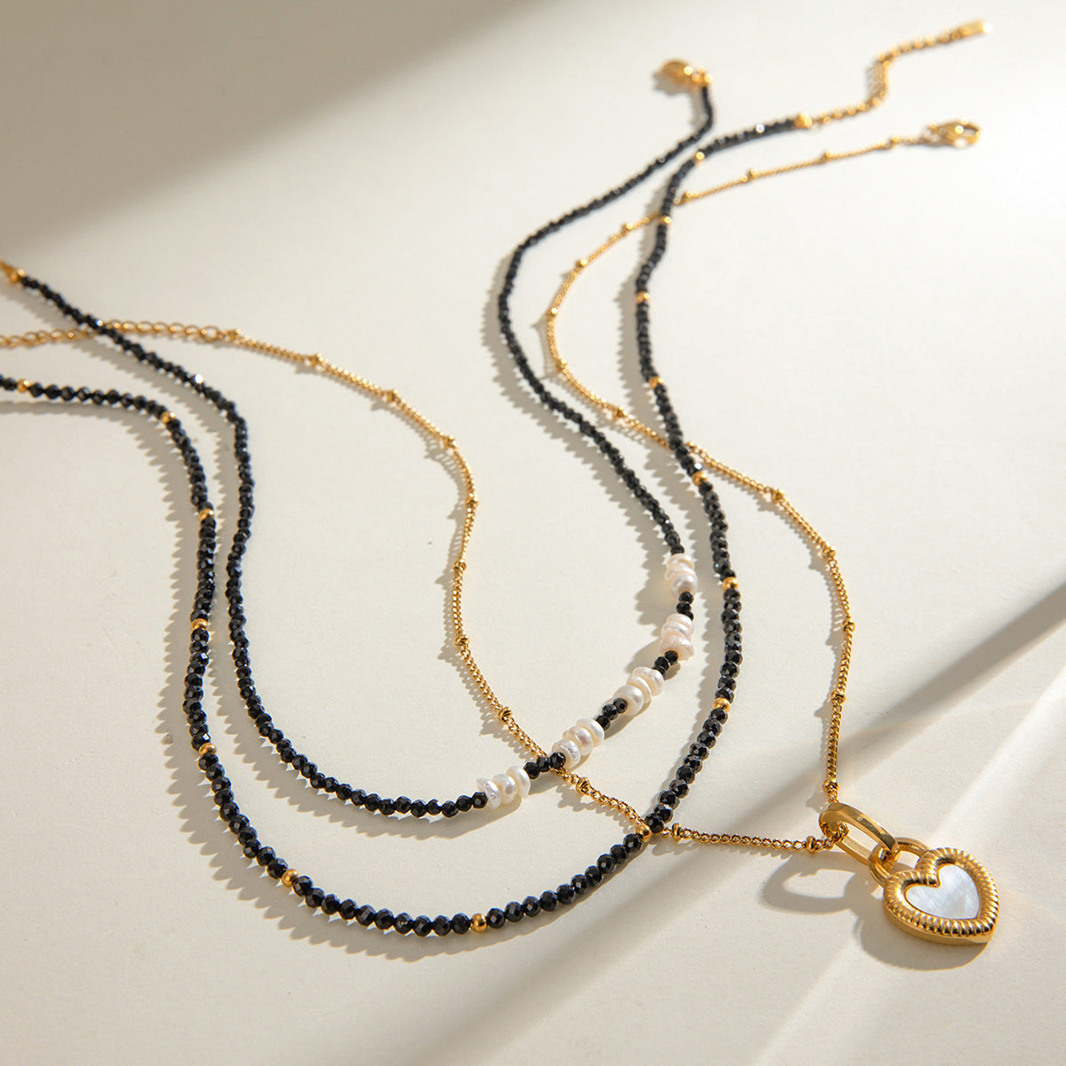 Black Heart Natural Stone Layered Necklace — flat lay 03