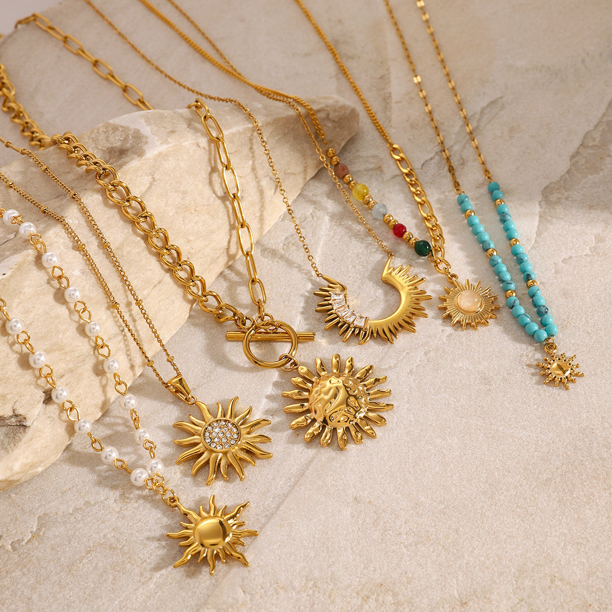 Sunburst Pendant Necklaces — flat lay 03