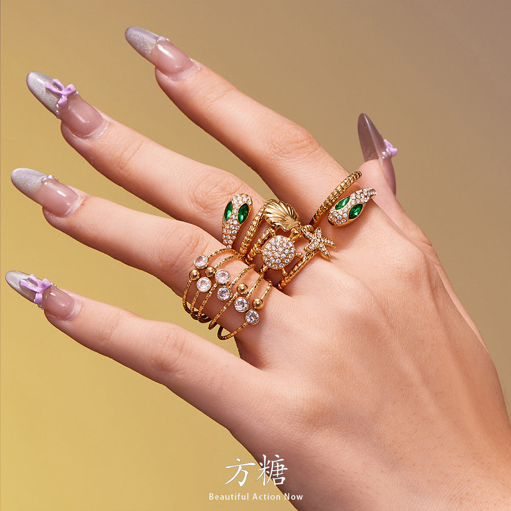 Ocean Motif Zircon Ring — styled view 03