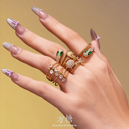 Ocean Motif Zircon Ring — styled view 03