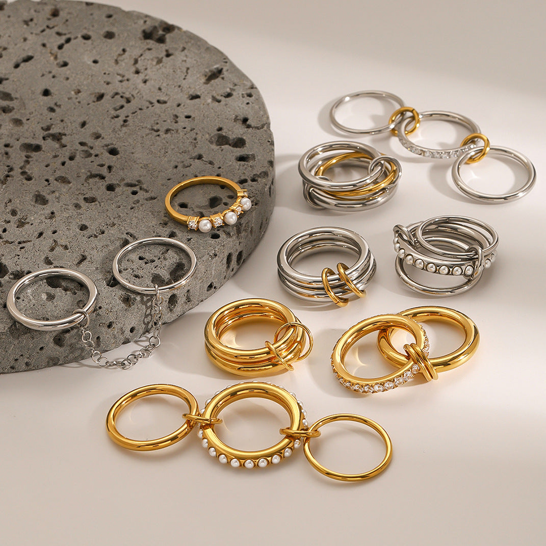 Assorted Stacking Pearl and Zircon Rings — flat lay 04