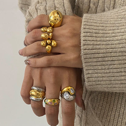 Assorted Sculptural Zircon Rings — styled view 02