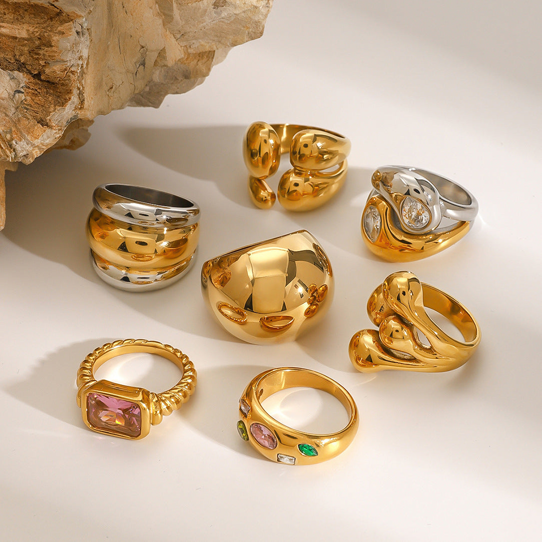 Assorted Sculptural Zircon Rings — flat lay 04
