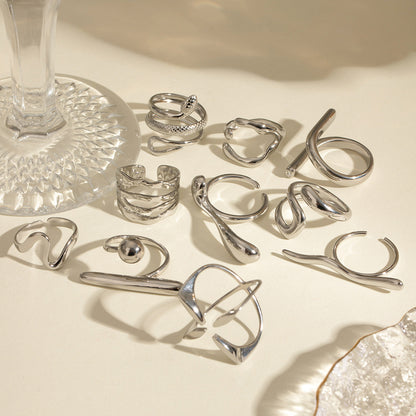 Silver-Tone Sculptural Open Rings — flat lay 04