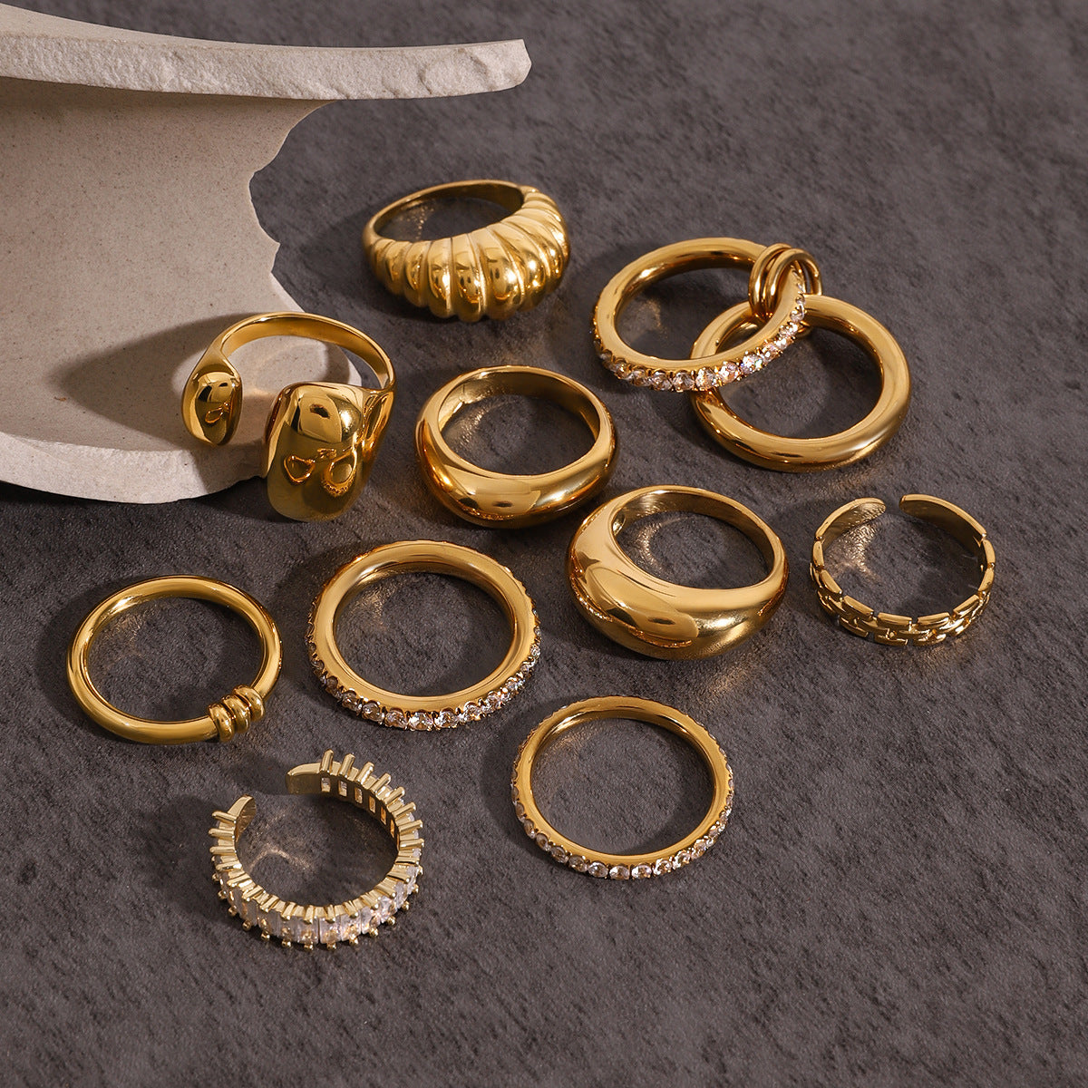 Assorted Gold-Tone Zircon Rings — flat lay 04