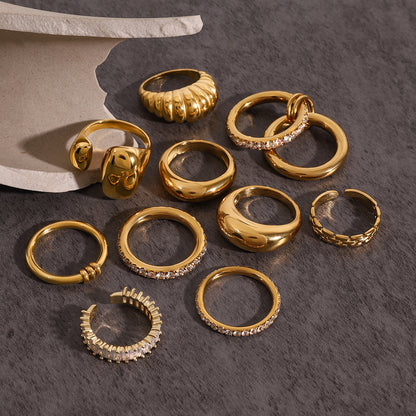 Assorted Gold-Tone Zircon Rings — flat lay 04