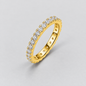Round Moissanite Eternity Band in 925 sterling silver.