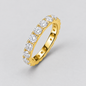 Round Moissanite Eternity Band in 925 sterling silver.