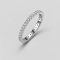 Round Moissanite Eternity Band in 925 sterling silver.