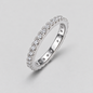 Round Moissanite Eternity Band in 925 sterling silver.