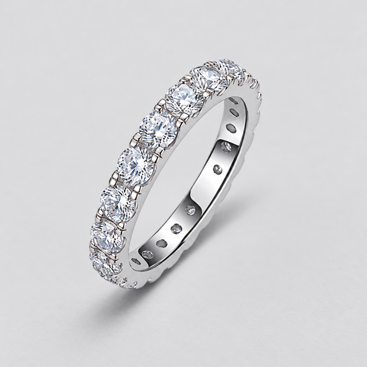 Round Moissanite Eternity Band in 925 sterling silver.