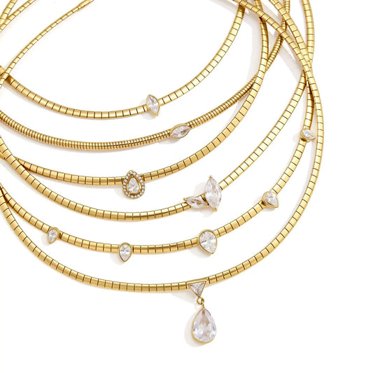 Snake chain necklace collection with assorted clear stone pendant shapes