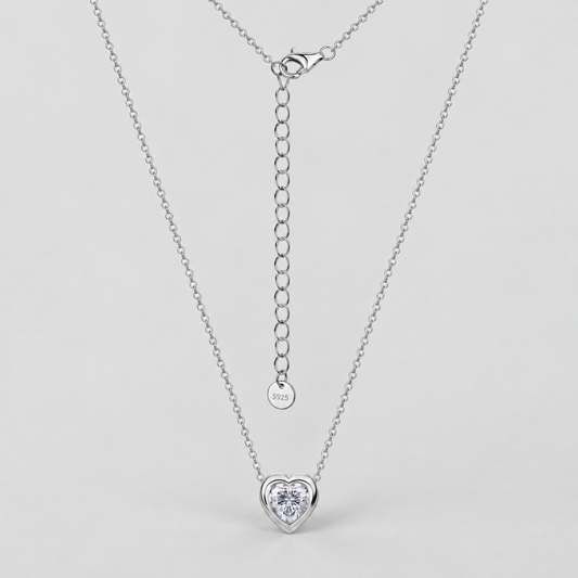 Bezel-Set Moissanite Heart Necklace in 925 sterling silver, silver finish.