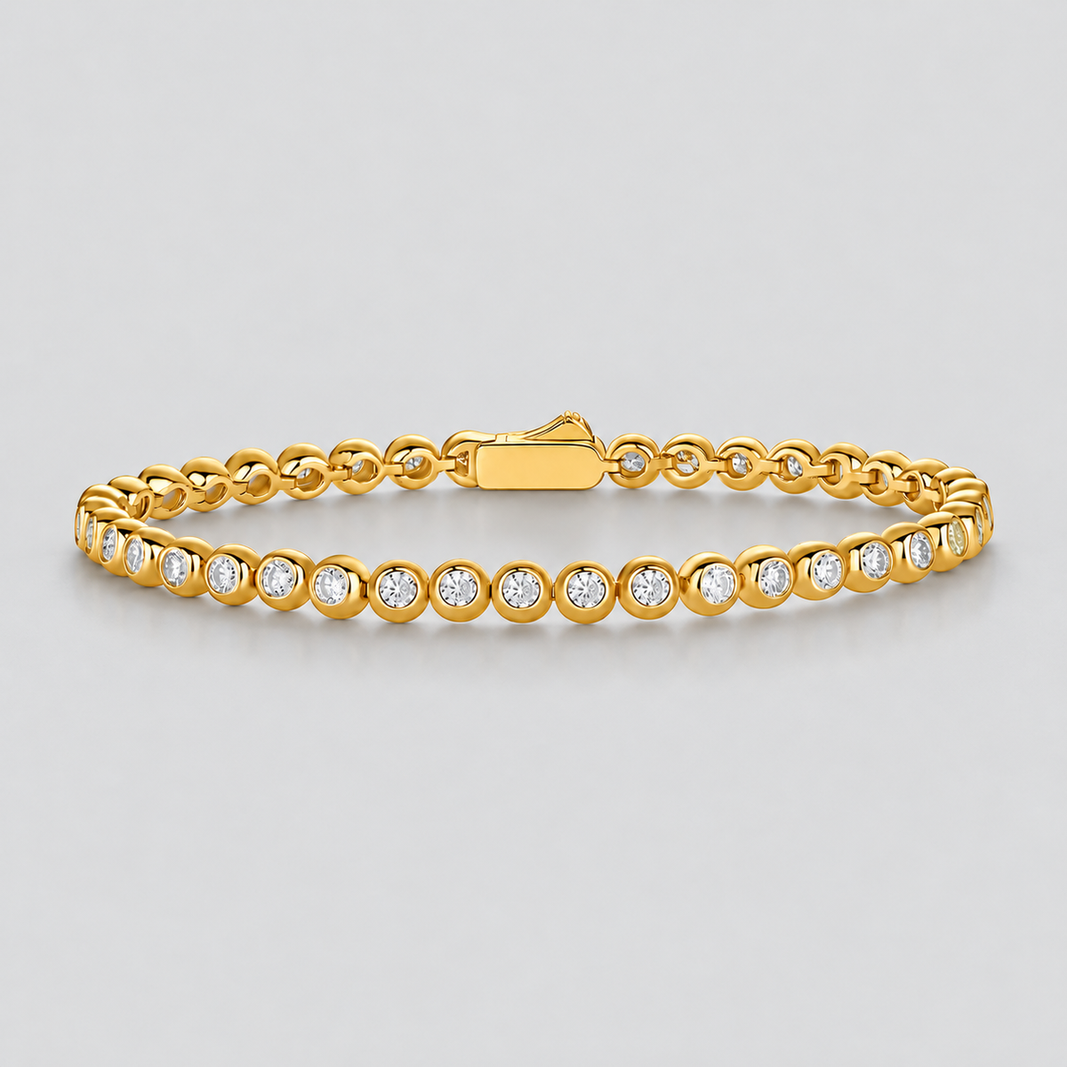 Bezel-Set Moissanite Tennis Bracelet in 925 sterling silver, gold finish.