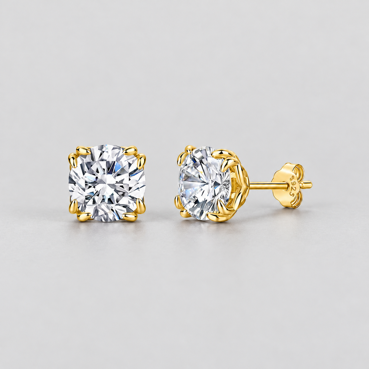 Eight-Prong Moissanite Stud Earrings in 925 sterling silver, gold finish.